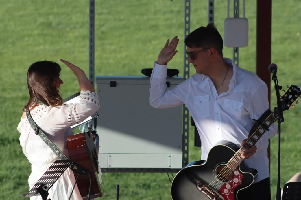 Duo performing outdoors